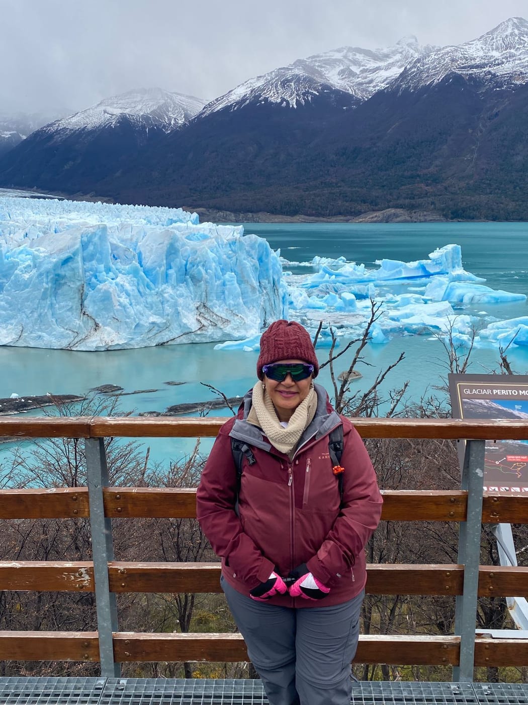 A guest at a viewpoint in front of the Perito Moreno Glacier